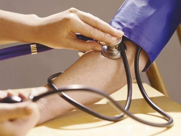 A patient's blood pressure being taken.